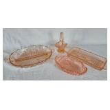 Pink Depression glass serving dishes and small