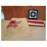 Afghan, pillow, and throw rug