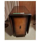 Double drop leaf table with drawer storage