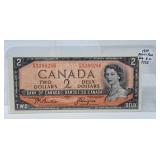 Devils Face 1954 Canada $2 Bill. Good UNC
