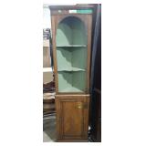 Corner Display Cabinet with Locking Bottom Door.