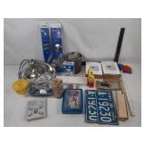 Assortment of house repair supplies including
