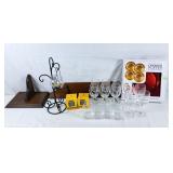 Charger Plates, wine glasses, candle holder, and