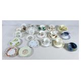 Tea cups with saucers, and various other saucers