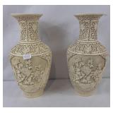 2 carved plastic decorative vases