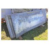 Over 40 sheets of galvanized sheet metal.