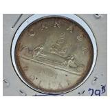 About Uncirculated 1961 Canada One Dollar Coin