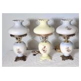 Trio of electric lamps. 18' high
