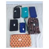 Large assortment of purses, wallets,