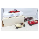 4 Franklin mint collectible cars