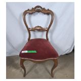 Victorian style balloon-back side chair with a