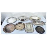 Assorted silver plated covered dishes, serving