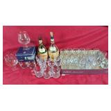 Assortment of whiskey glasses, wine glass, shot