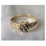10K gold gemstone  Ring. Ring is Size 4.5.