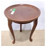 Vintage round side table, potentially styled