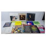 Piano books, guitar books, and records