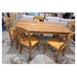Solid wood dinning table with 5 chairs needs some