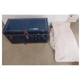 Blue steamer trunk with bag