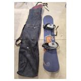 Snowboard with travel bag