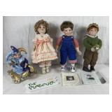 Four Porcelain Dolls one is a Music Box