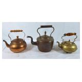 Trio of copper tea pots