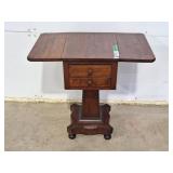 Drop-leaf pedestal side table