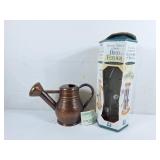 Hammered copper watering can and bird feeder
