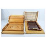 Bread box, wooden cutting board, serving trays,