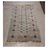 Area carpet. 61" l x 38" w