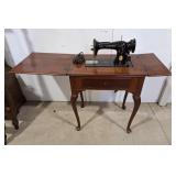 Singer sewing machine with table. Singer