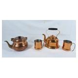 Copper tea pots and 2 mugs