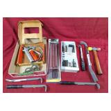 Grease gun, pry bars, steel socket holder set,