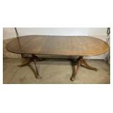 Oval Dining Table with 20in Leaf and brass Claw