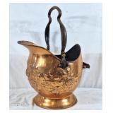 Elegant copper coal scuttle. Features ornate