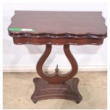 Vintage games table featuring a swivel flip-top