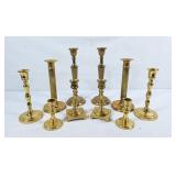 5 matching sets of brass candle stick holders