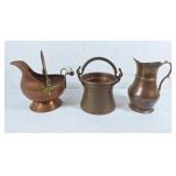 Copper coal scuttle, copper cauldron, and pitcher