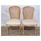French provincial-style cane back chairs.
