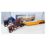 Pair of collectible toy truck haulers