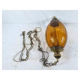 Hanging amber glass light fixture