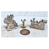 Mickey mouse bank, train bank, brass coaster, and