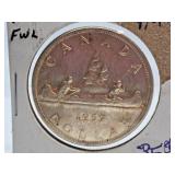 About Uncirculated 1957 Canada One Dollar With
