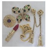 Brooches: Butterfly, lipstick, etc