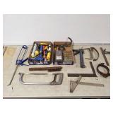Mayes square, hack saw, square, caulking gun,