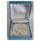 Circle Brooch signed 70PM  925 in Birks Box