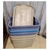 5 plastic totes and 4 lids.