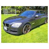 2013 BMW 750 XI. 208,163 +/- kms