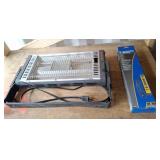 Marvin heater and 6 outlet metal power bar