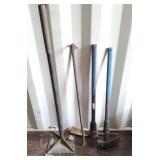 Pick axe, pry bar, ground tamper, and axe