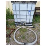 1000 liter tank with metal cage & hose. 37 1/2" l